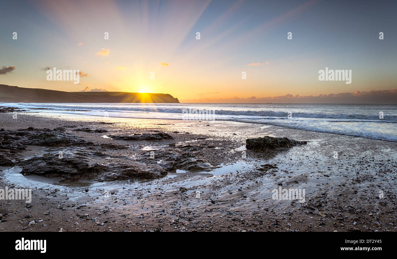 Sunrise at Pendower beach on the Roseland Peninsula in Cornwall Stock Photo