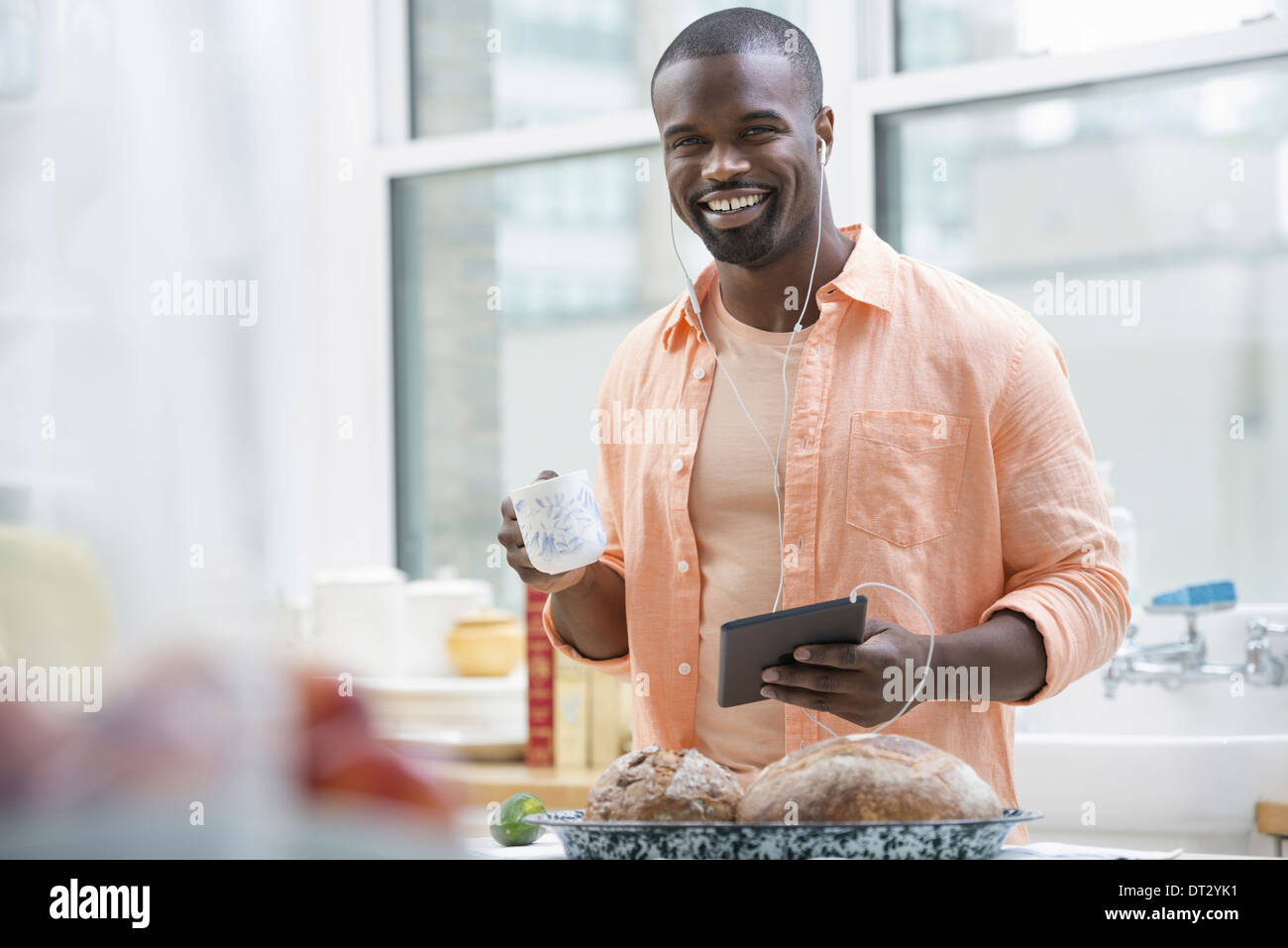 Person in orange shirt hi-res stock photography and images - Alamy