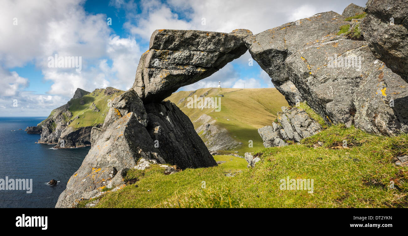 Looking through The Mistress Stone towards the west facing cliffs on Hirta, St Kilda Stock Photo