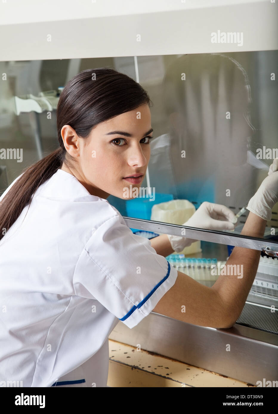Confident Technician Experimenting In Laboratory Stock Photo - Alamy