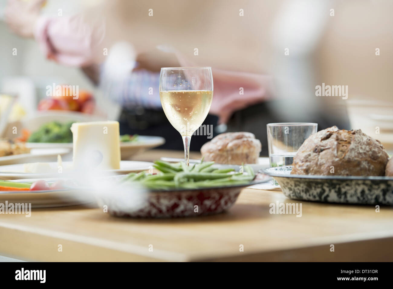 An open plan office A working lunch a salad buffet of mixed ages and ethnicities meeting together Stock Photo