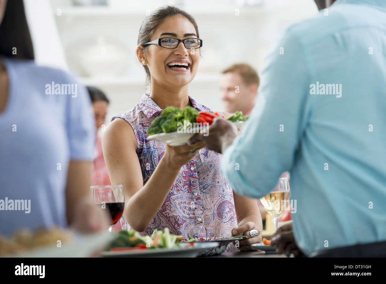 A picnic party of family adults and children Stock Photo