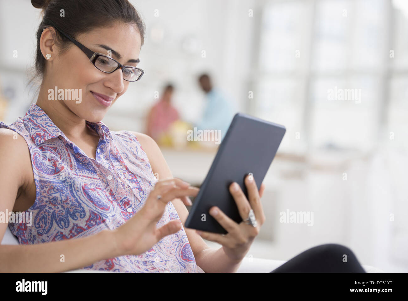 Professionals in the office A light and airy place of work A young ...