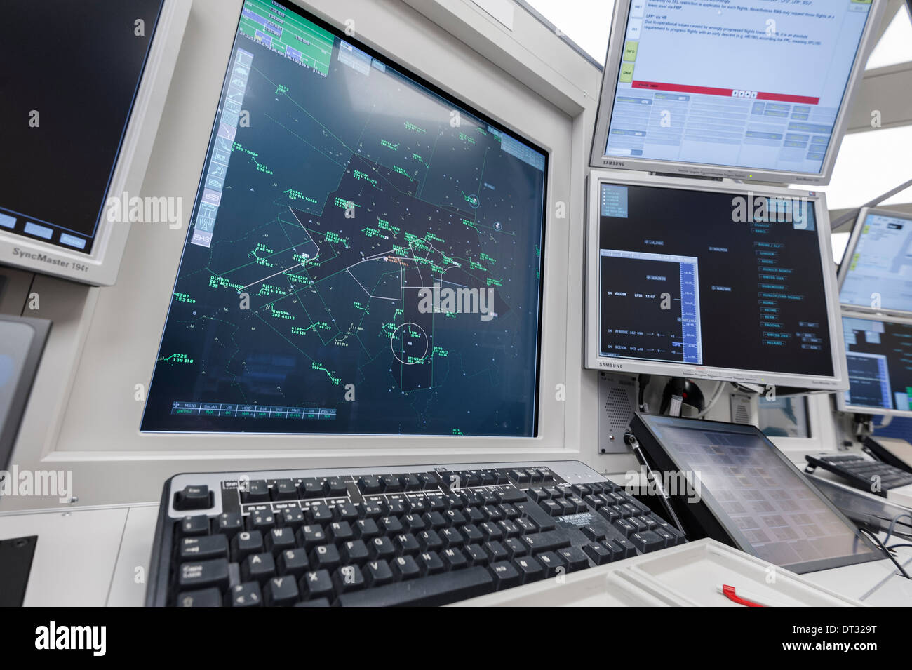 Computer monitors in the air traffic control centre of 'Skyguide' show flight paths of aircrafts in Switzerland's busy airspace Stock Photo