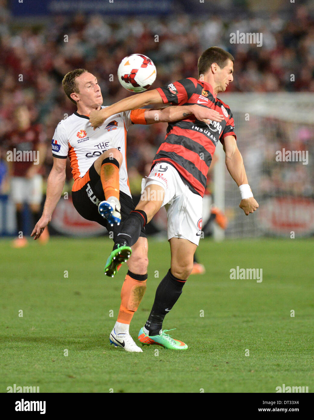 Sydney, Australia. 07th Feb, 2014. Brisbane Roar captain Matt Smith and Wanderers forward Tomi Juric in action during the Hyundai A League game between Western Sydney Wanderers FC and Brisbane Roar FC from the Pirtek Stadium, Parramatta. The game ended in a 1-1 draw. Credit:  Action Plus Sports/Alamy Live News Stock Photo