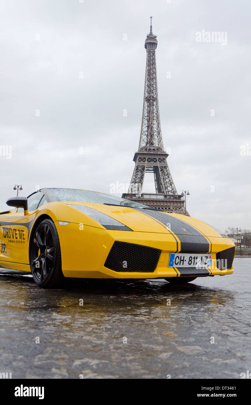 Lamborghini Gallardo for rent at a luxury car hire company with eiffel tower in background, Paris, France. Stock Photo