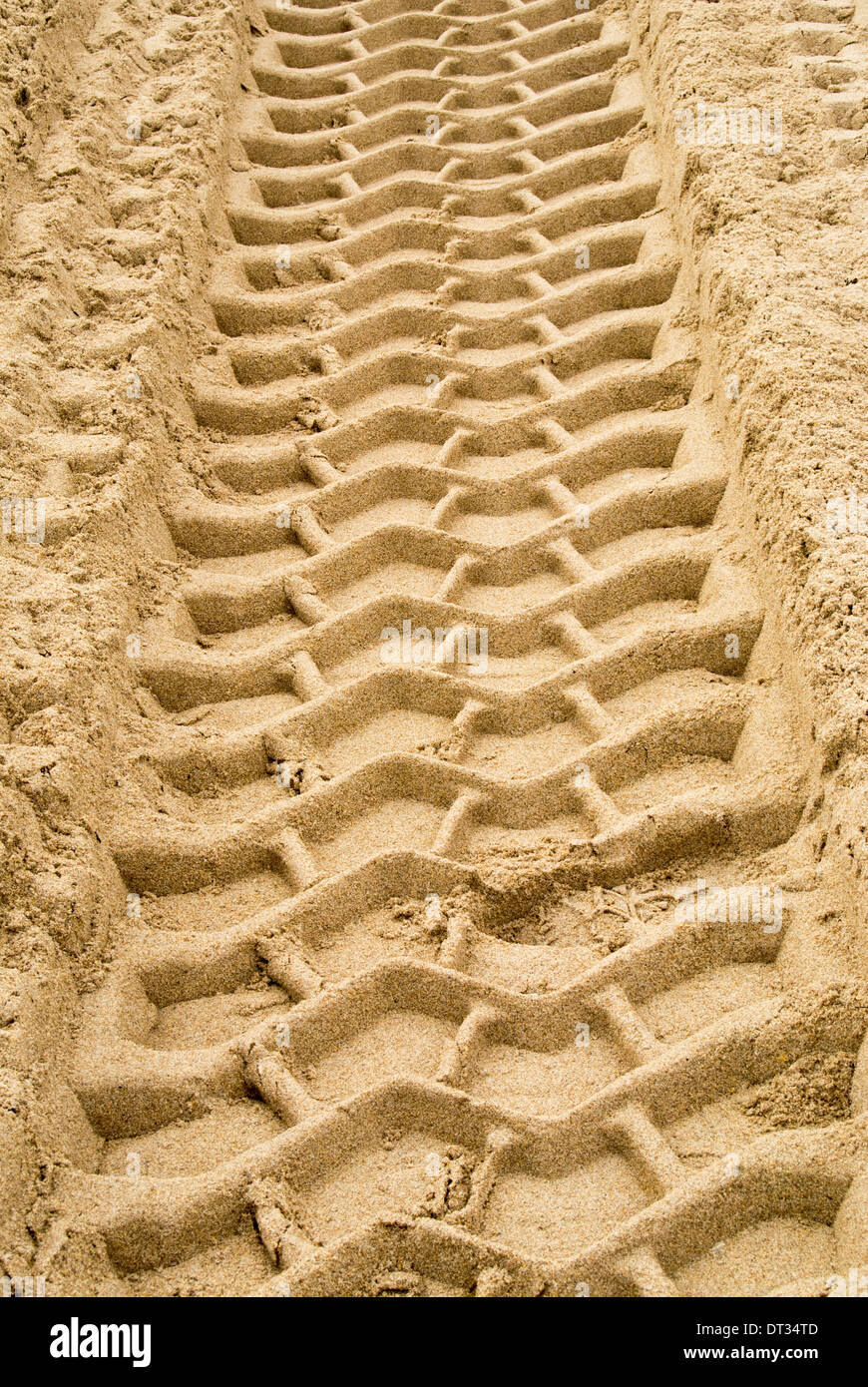 Tire tread pattern in sand. Stock Photo