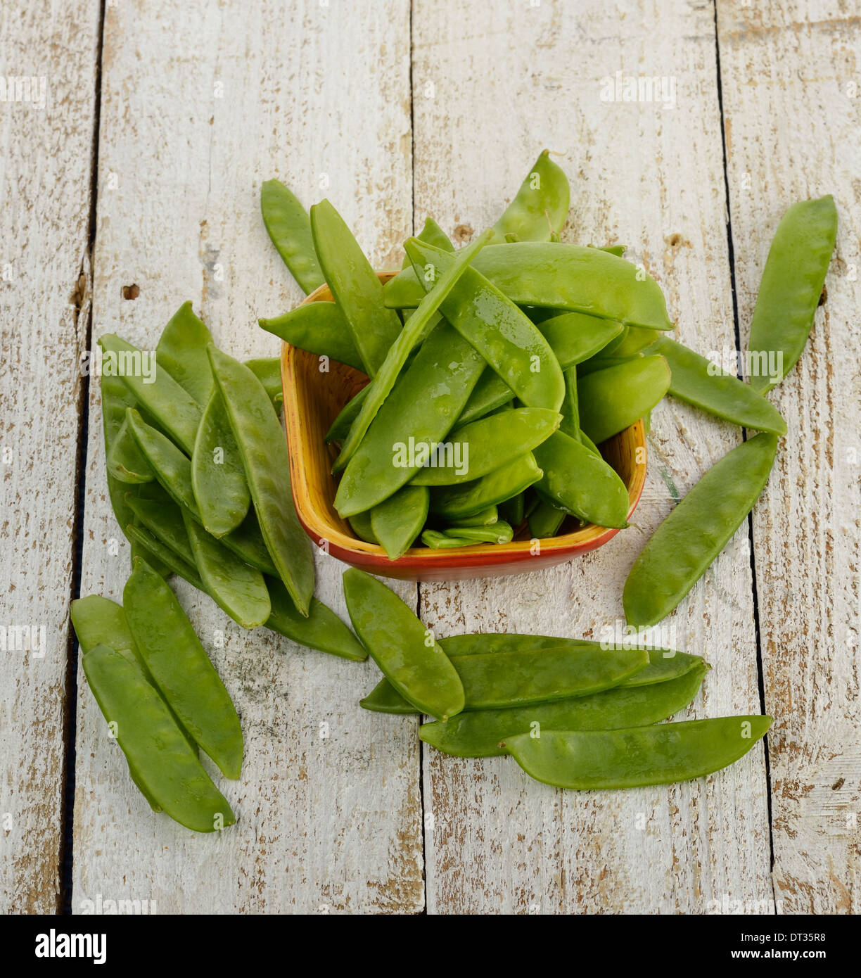 Edible Podded Peas In A Bowl Stock Photo