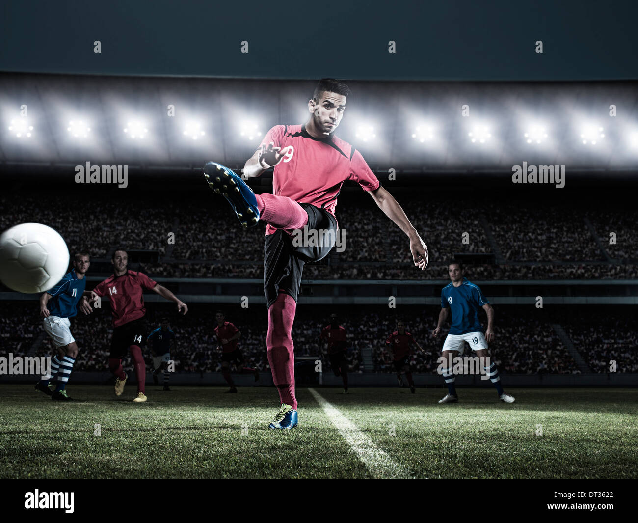 Footballer kicking ball hi res stock photography and images Alamy