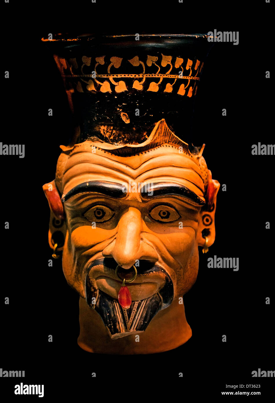 Charun 400 BC  ugliness of the Etruscan death damon (Barbarian body jewelry) Etruscan head Tuscany Etruria Italy Stock Photo