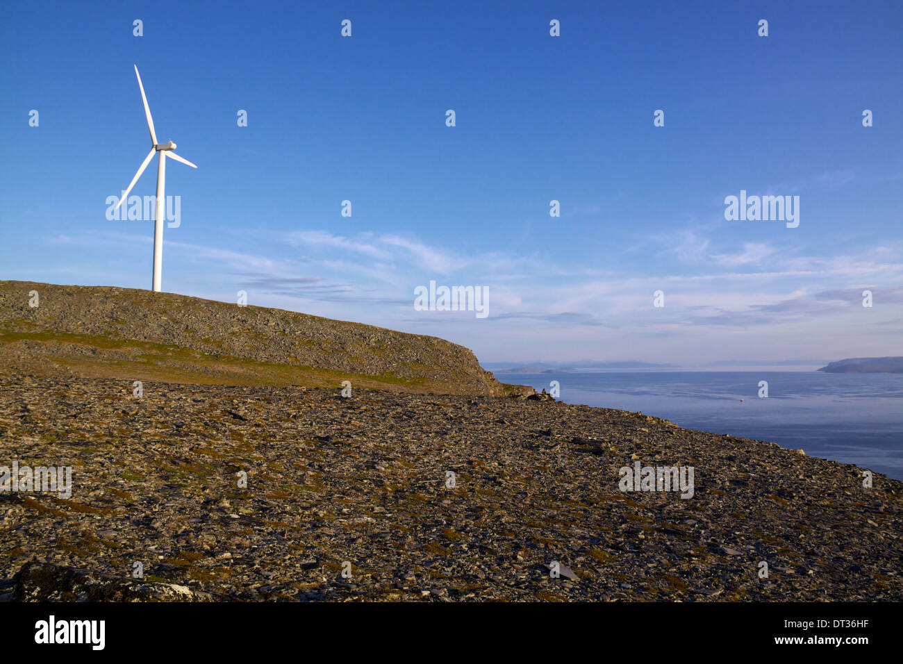 Wind turbine in Arctic high above the sea on Havoy, Norway Stock Photo