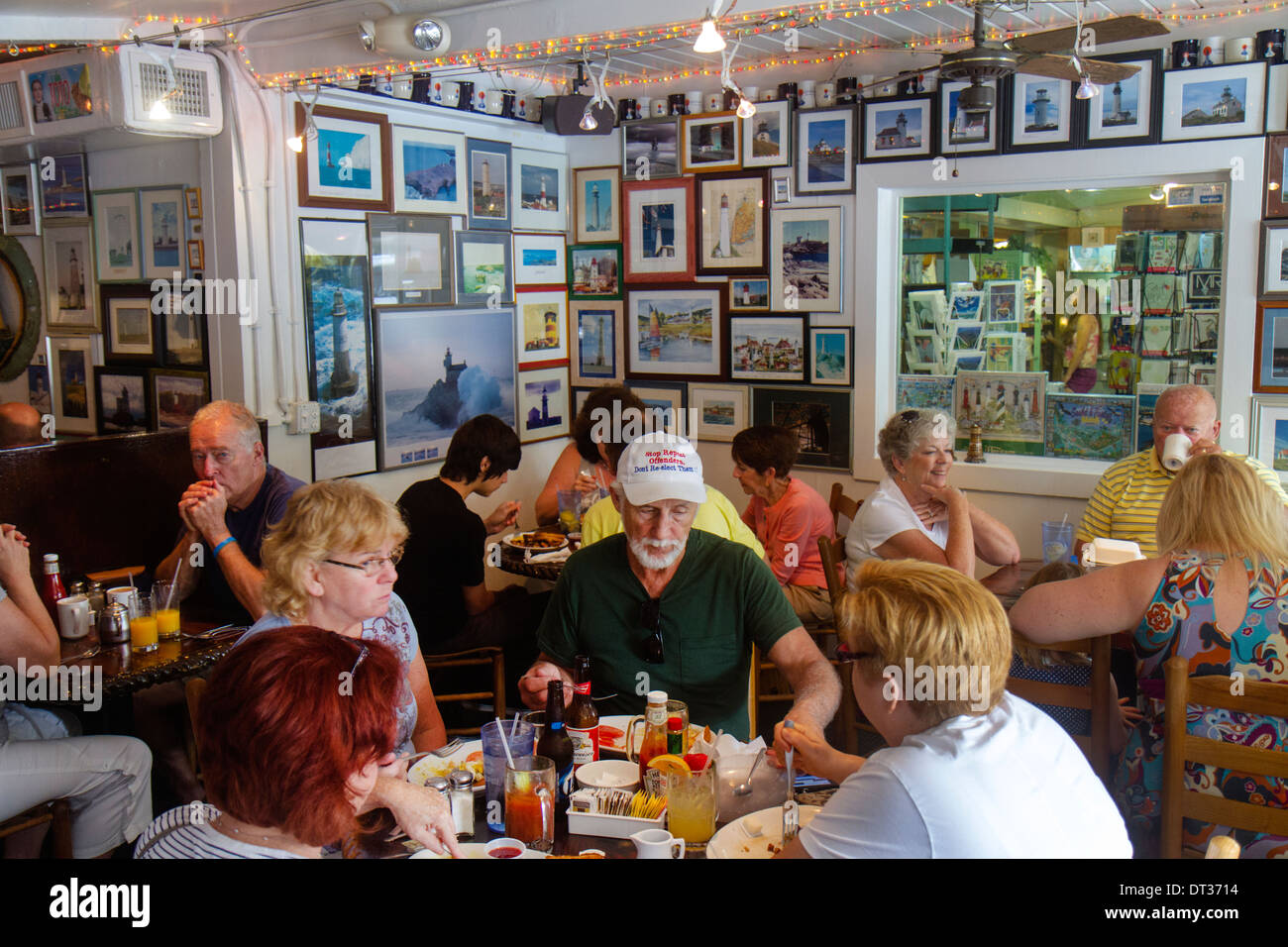 Florida Sanibel Barrier Island,The Lighthouse Cafe,restaurant restaurants  food dining eating out cafe cafes bistro,interior inside,tables,adult  adults Stock Photo - Alamy