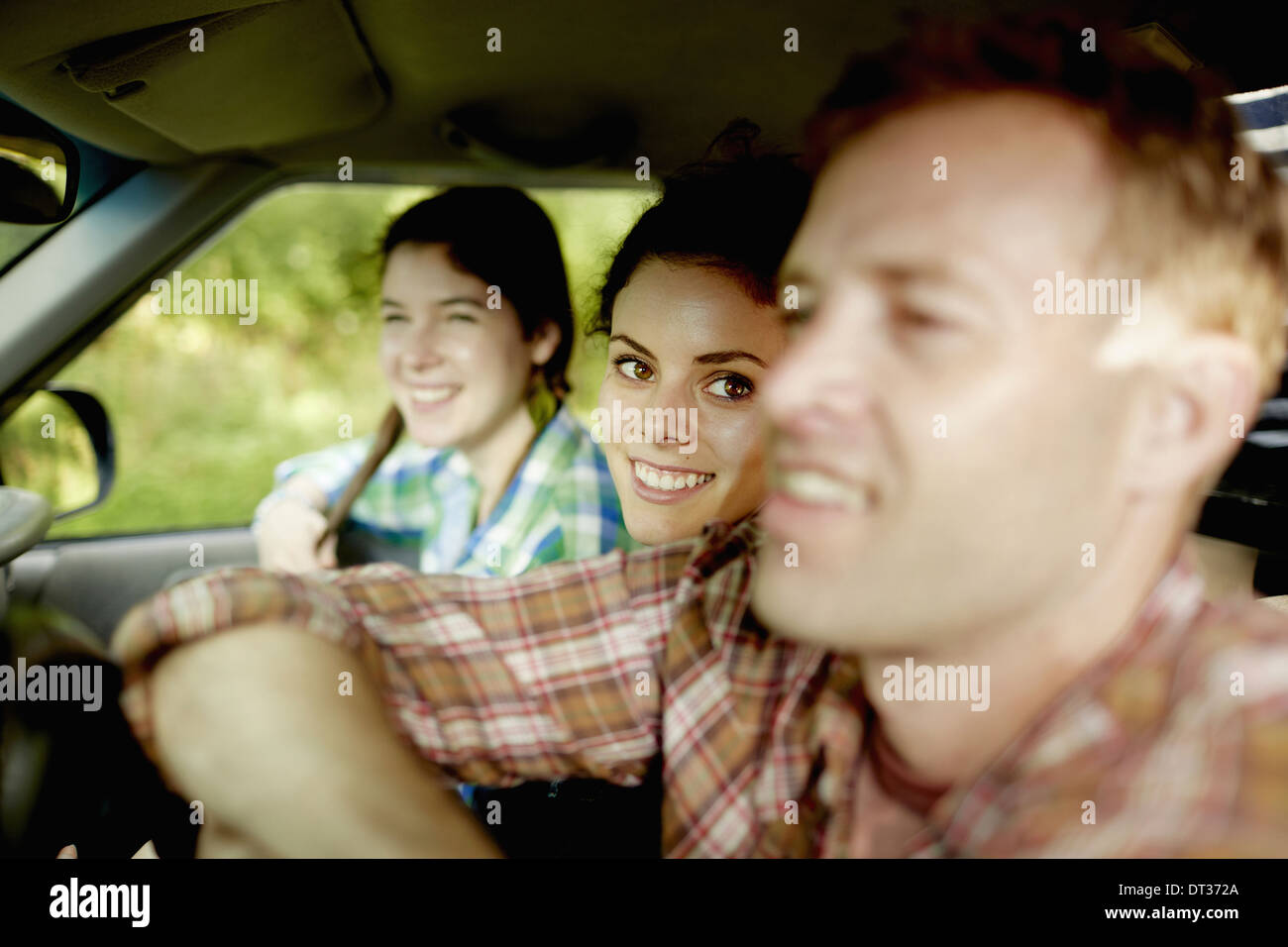 Three passengers in the cab of a pickup truck Stock Photo Alamy