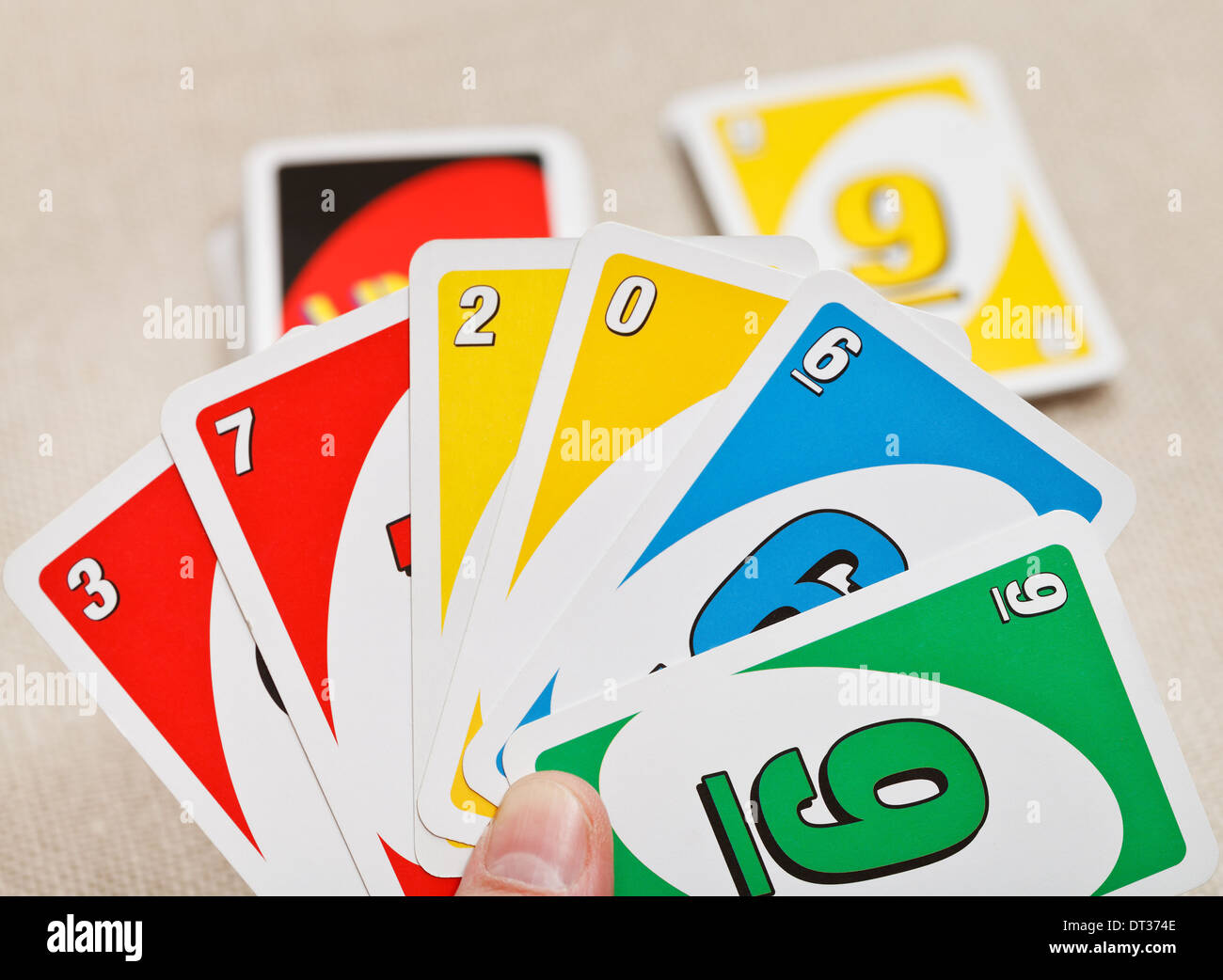Playing American Card Game Uno, Holding Game Cards in Female Hand