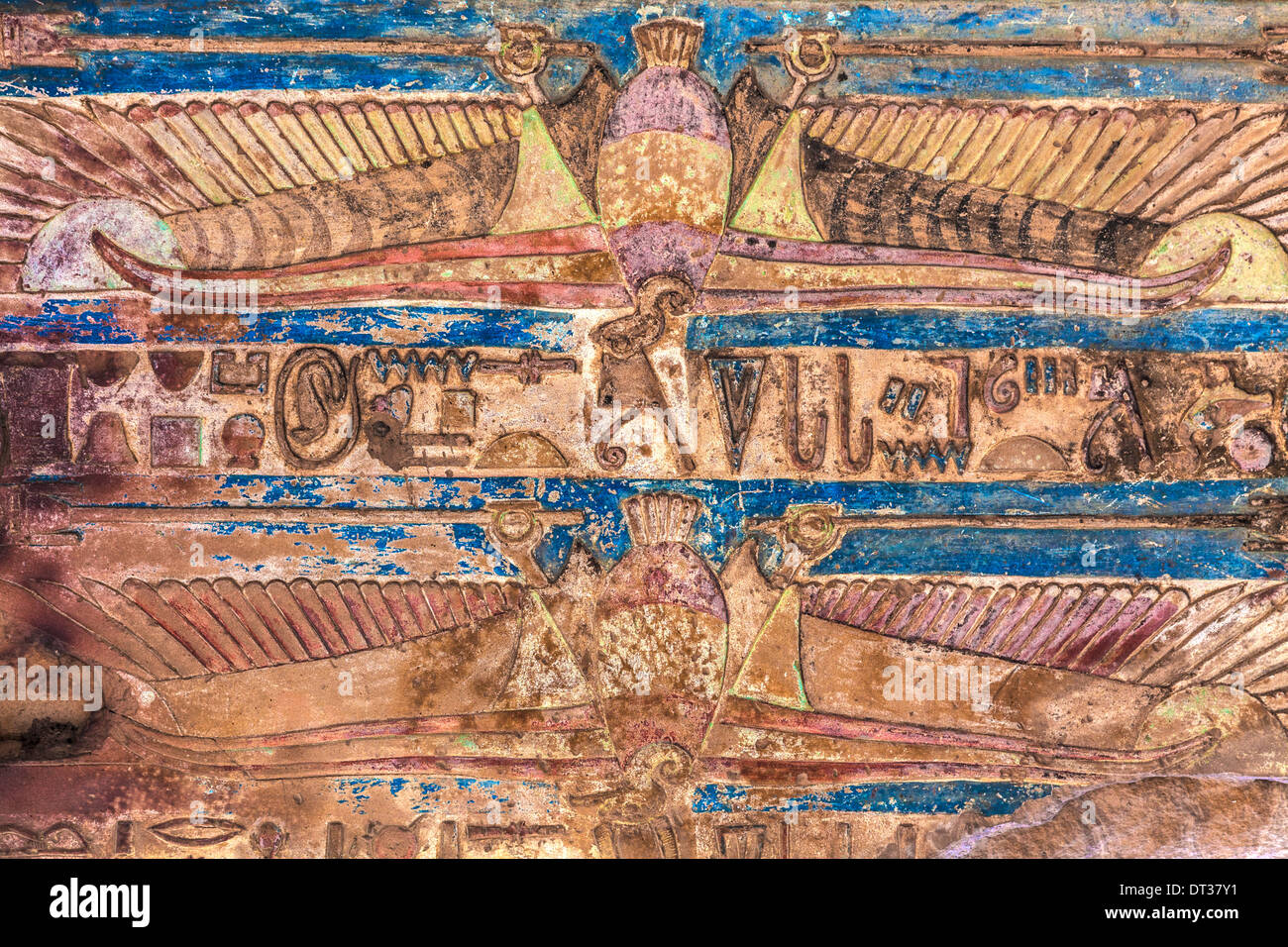Colourful carvings and hieroglyphs painted on a ceiling at the Ancient Egyptian Temple at Kom Ombo. Stock Photo