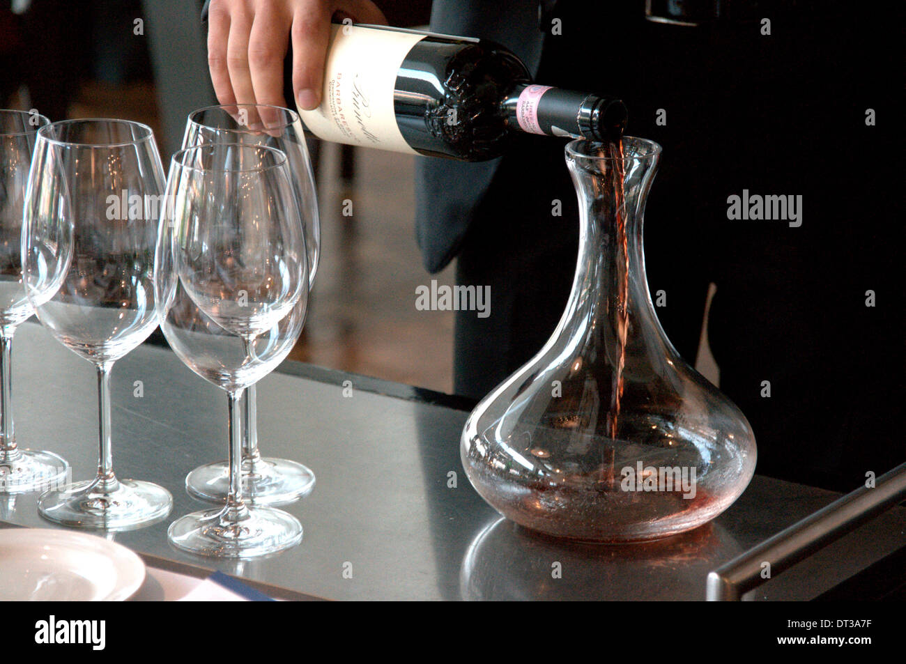 Decanting red wine Stock Photo Alamy