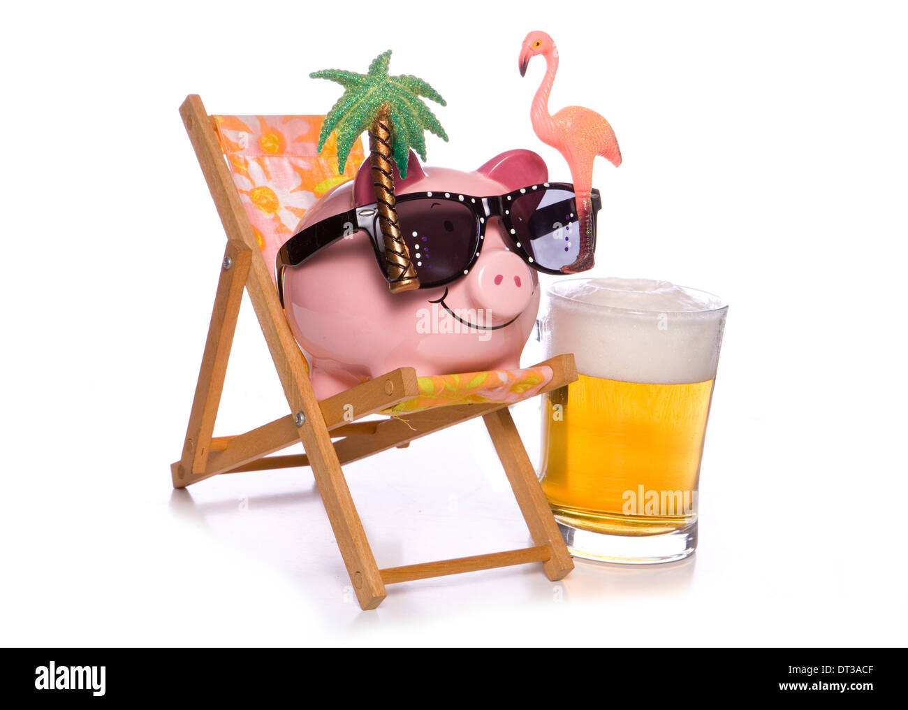 piggy bank on holiday with a beer Stock Photo