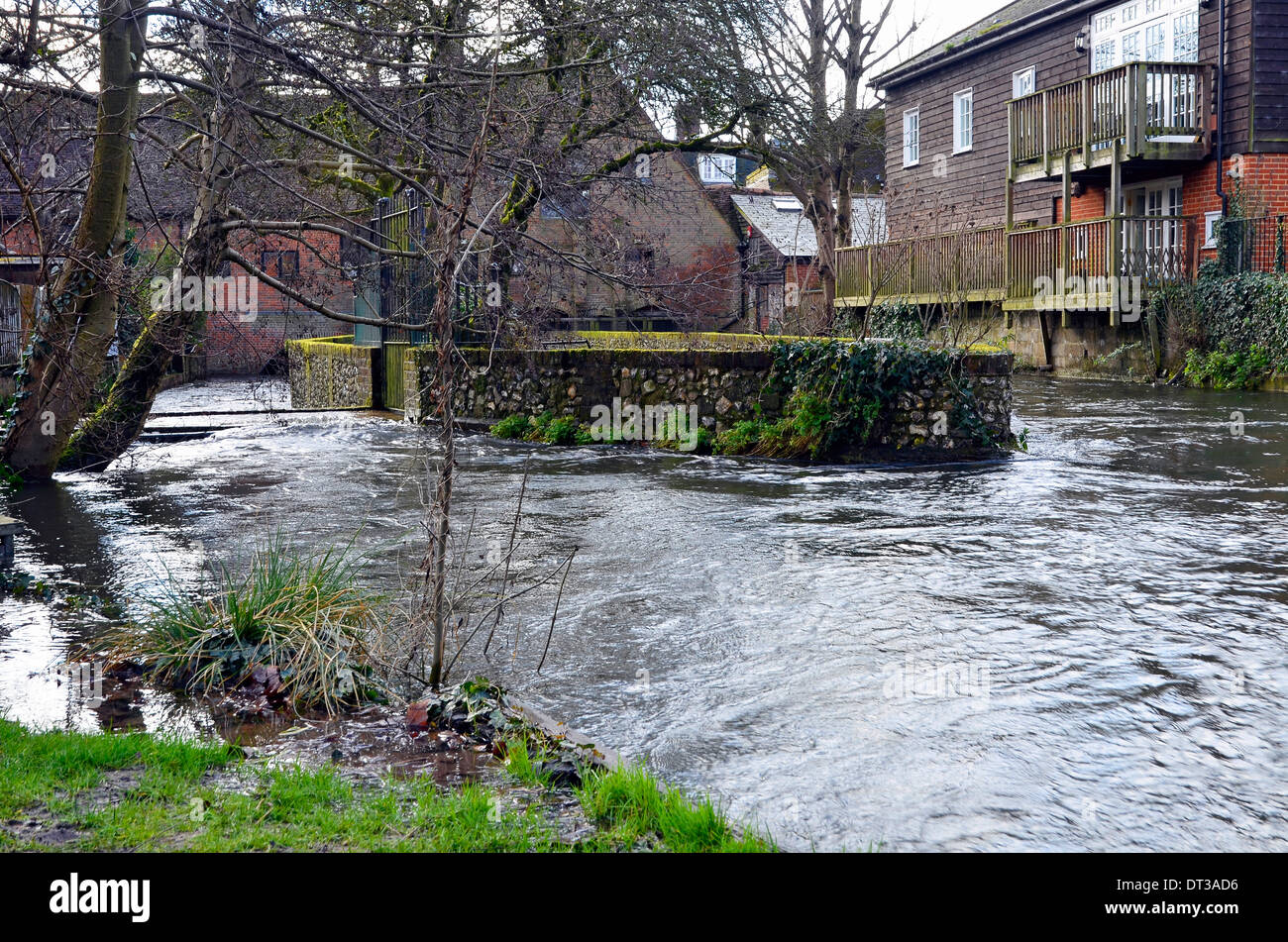 Very high water levels in the River Itchen in central Winchester above City Mill threaten to inundate Water Lane, Feb 2014 Stock Photo