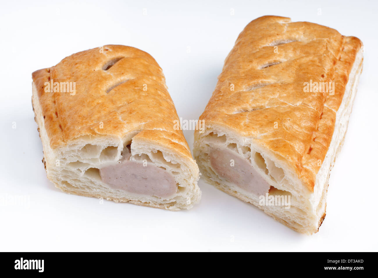 Pork sausage roll in puff pastry on a white background Stock Photo Alamy
