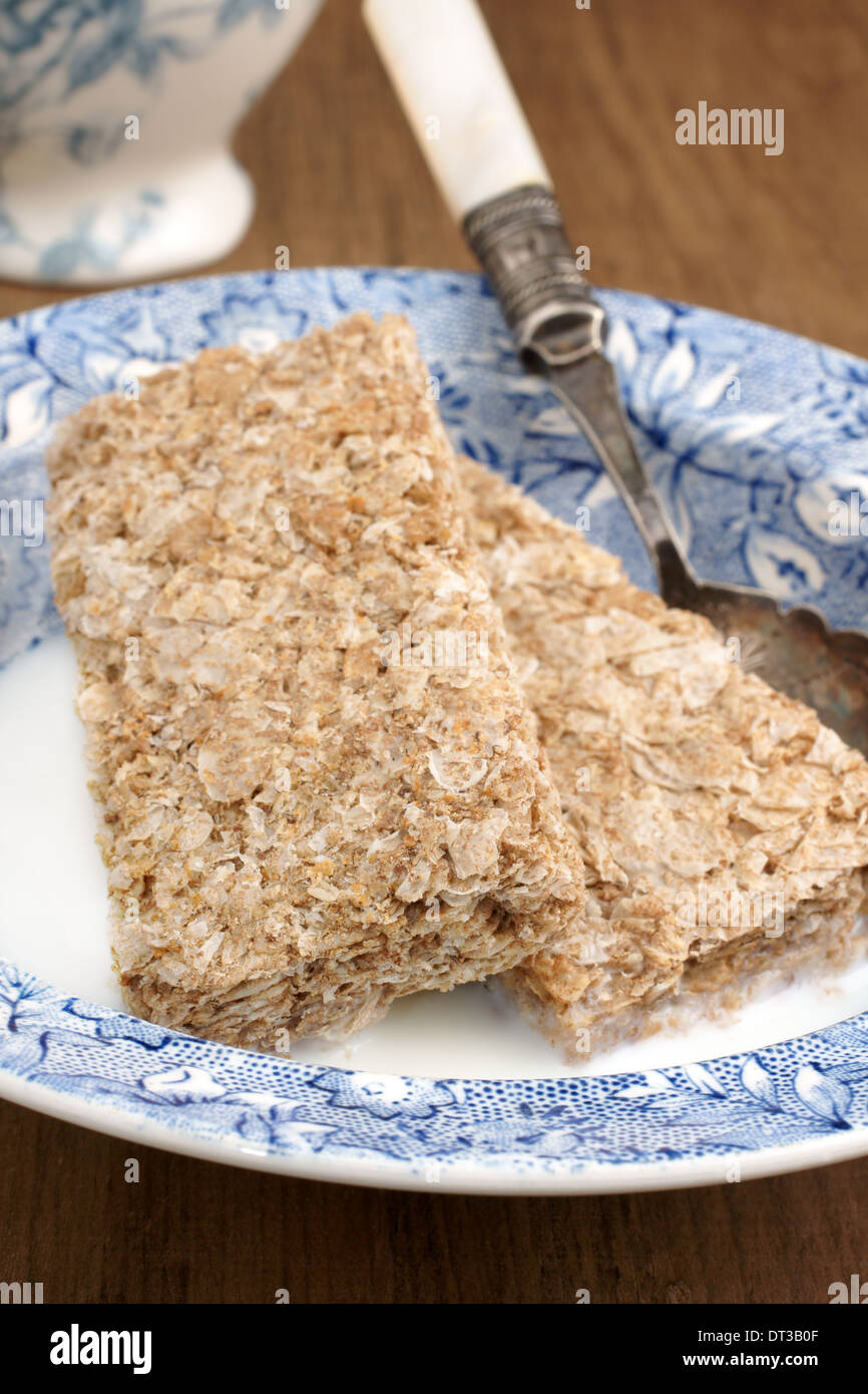 Wheat biscuits breakfast cereal with milk Stock Photo Alamy