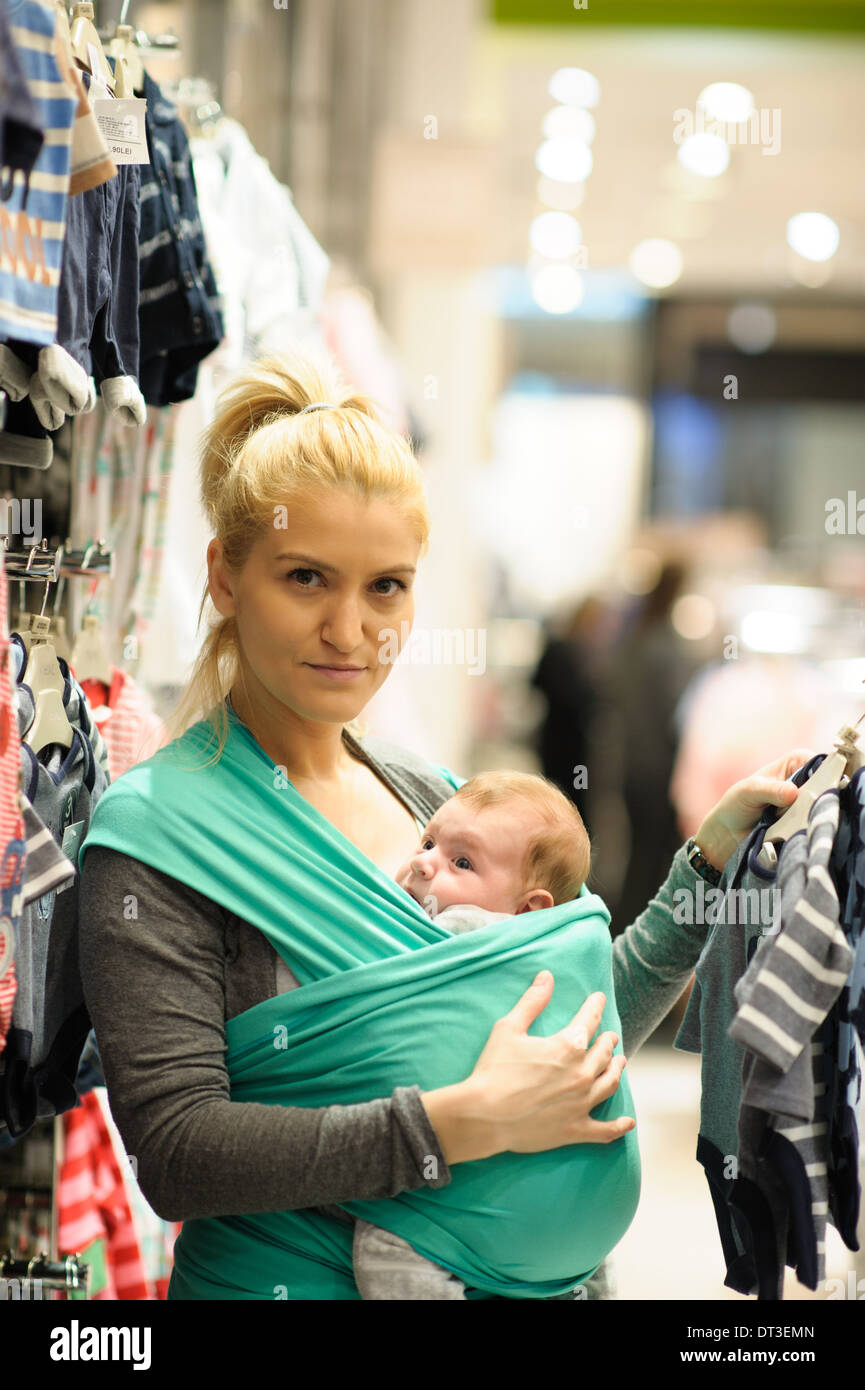 Mother and son shopping for clothes Stock Photo Alamy