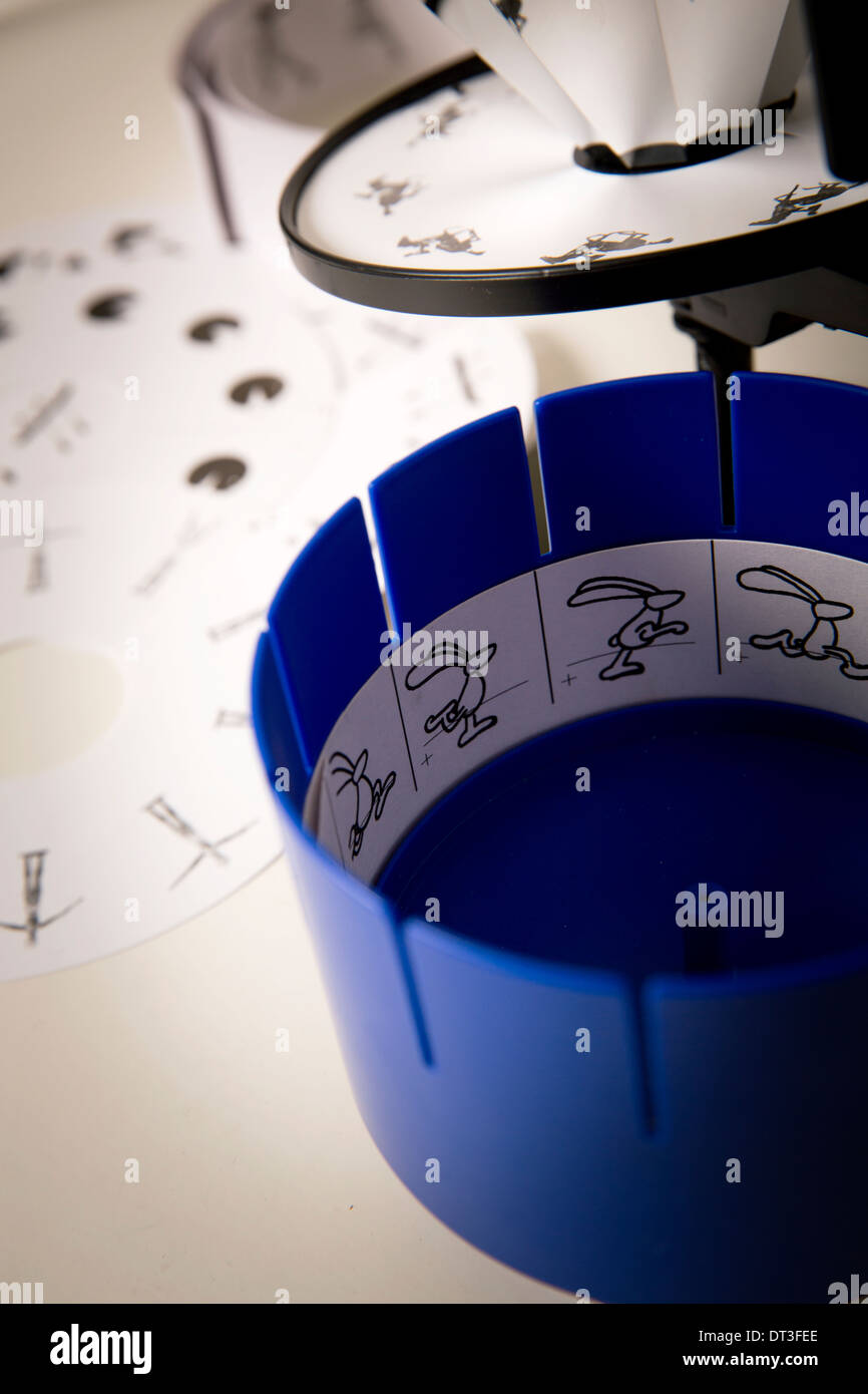 Collection of early animation tools in the form of a Zoetrope and a Praxinoscope Stock Photo