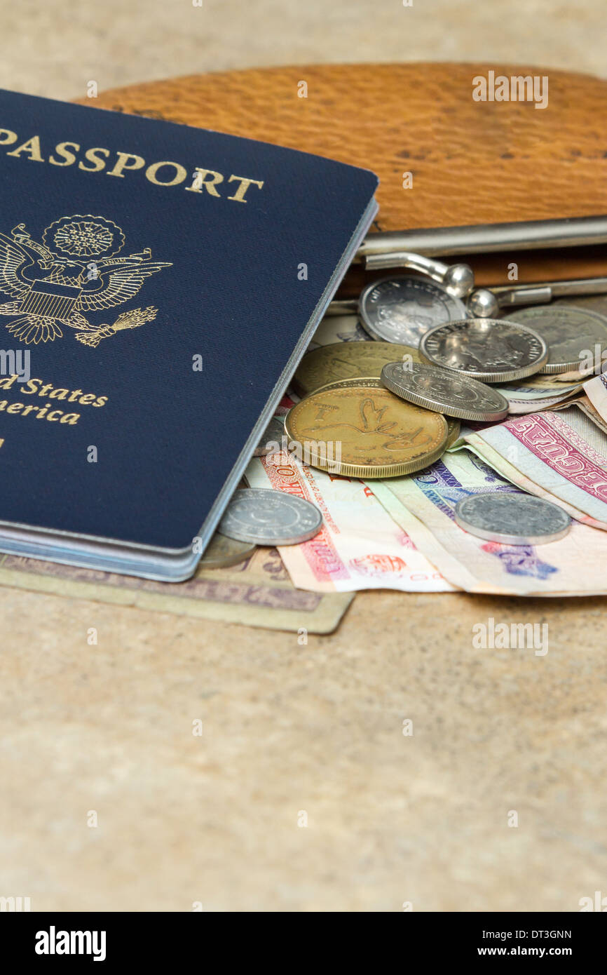 travel documents and different international currencies on a counter top Stock Photo Alamy