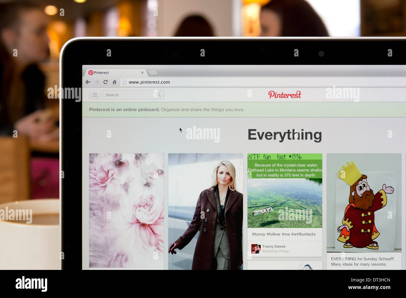 The Pinterest website shot in a coffee shop environment (Editorial use only: print, TV, e-book and editorial website). Stock Photo