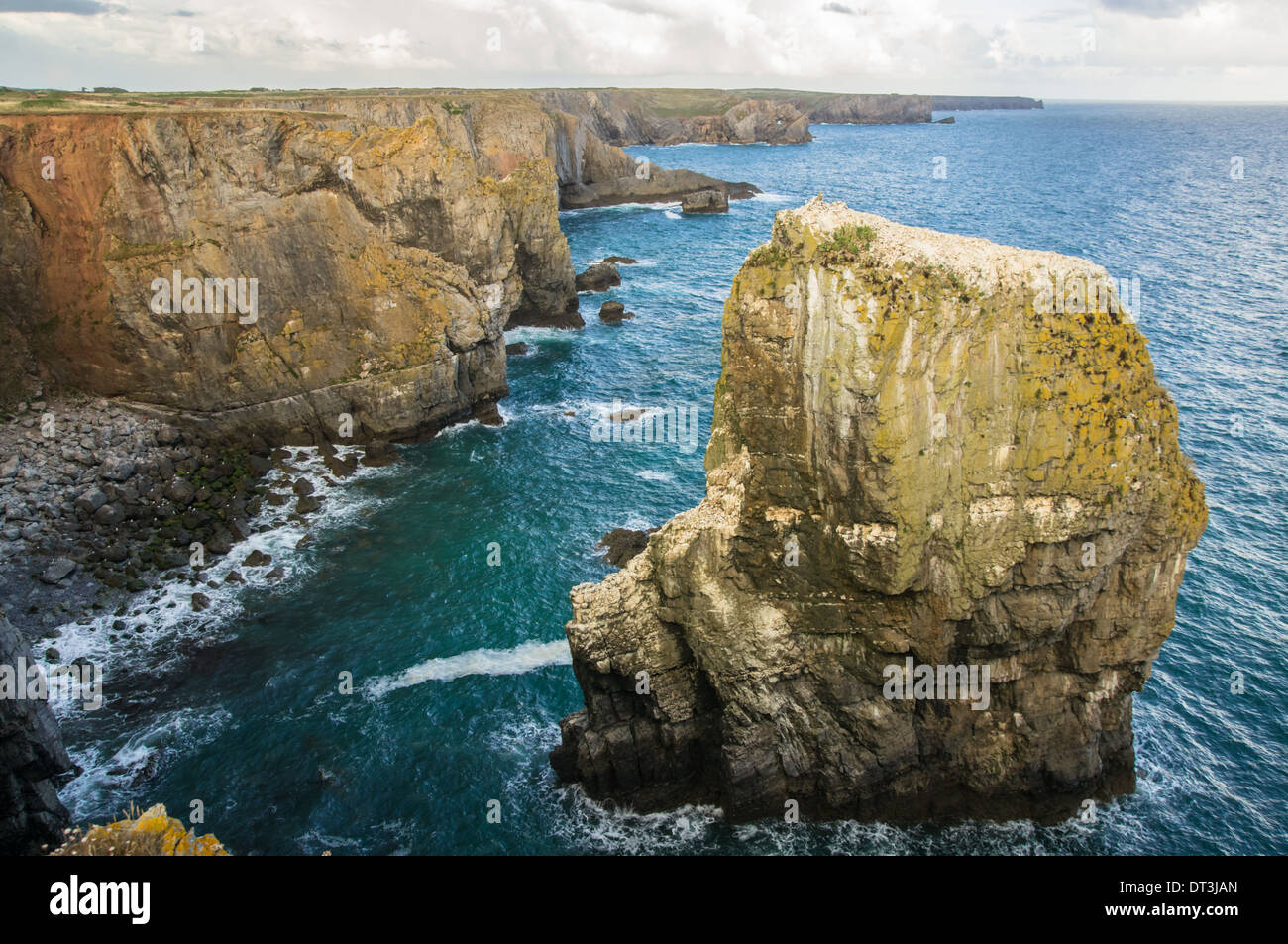Rocky coast and blue sea in Pembrokeshire Coast National Park in Wales United Kingdom UK Stock Photo