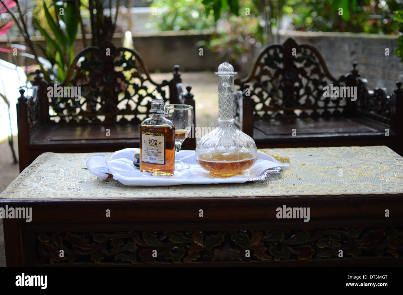 Brandy is a type of liquor offered in the ritual pilgrimage at the tomb