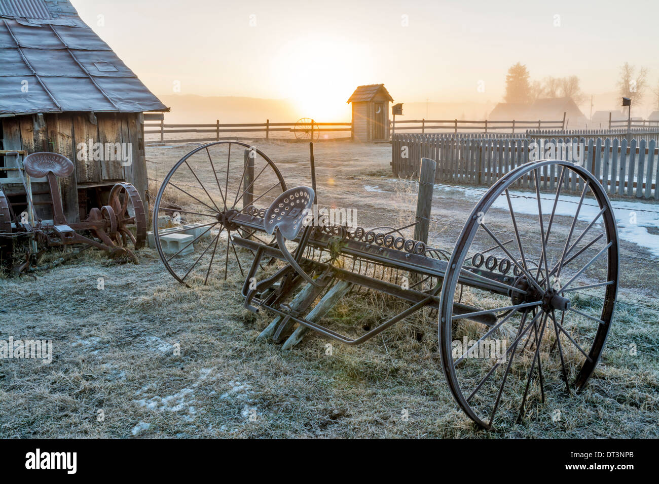 Rustic farm scene at sunrise Stock Photo