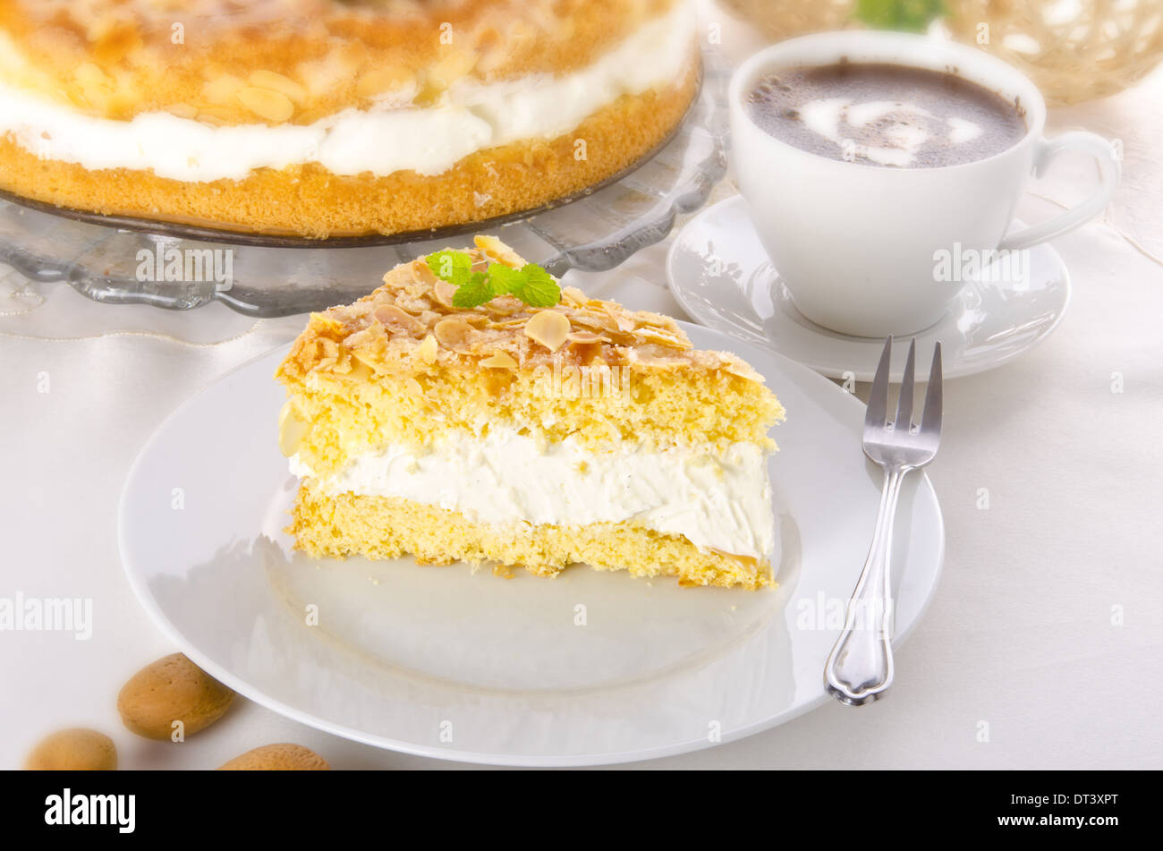 flat cake with an almond and sugar coating Stock Photo