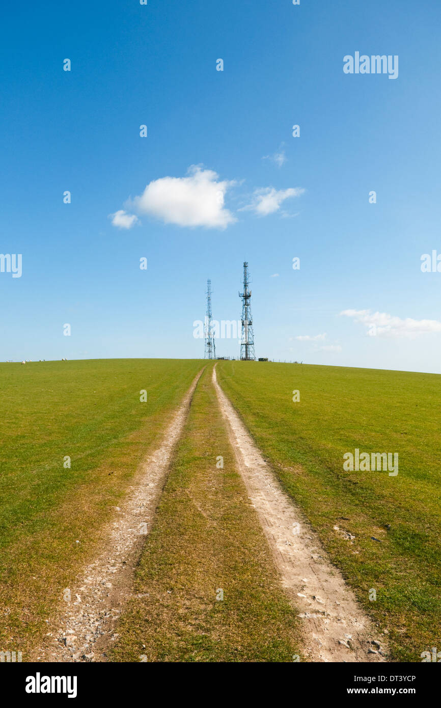 Path to the radio masts on the South Downs Way at Beddingham Hill near Firle Beacon in East Sussex, UK Stock Photo