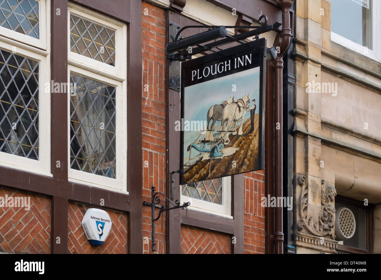Pub sign of the PLOUGH INN Baxtergate Whitby North Yorkshire England Stock Photo