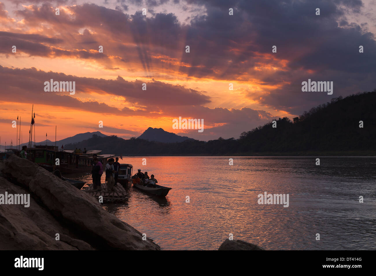 Dramatic sunset view over the Mekong in Luang Prabang, Laos Stock Photo