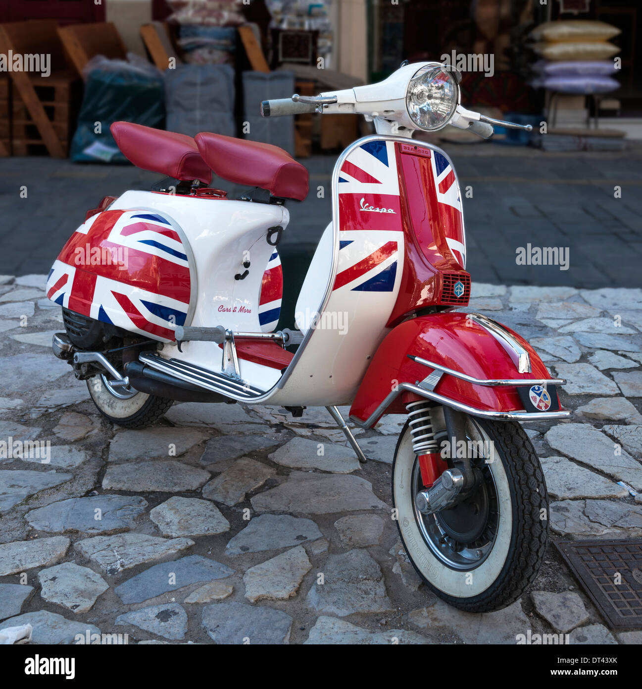 A Piaggio Vespa scooter, painted with the flag and colours of the Union Jack, seen in Kalamata, Peloponnese, Greece Stock Photo