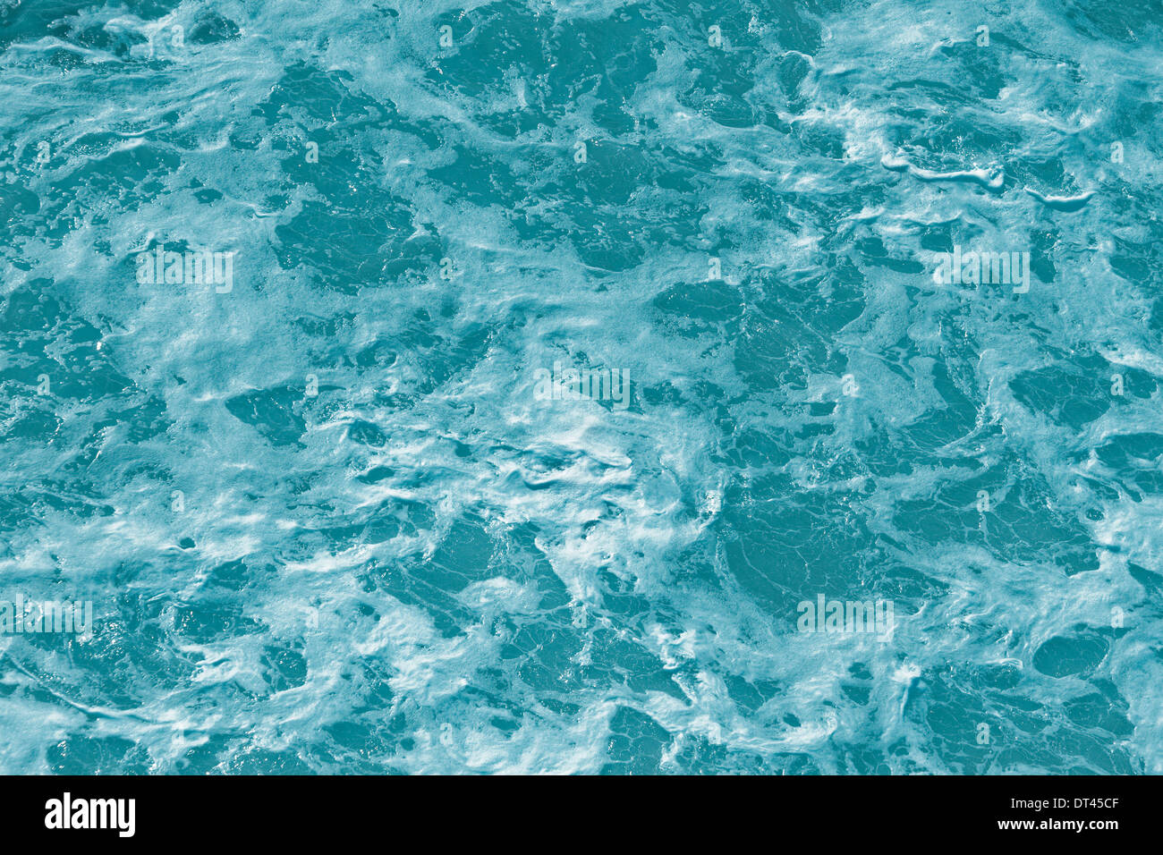 Foam on the water blue background Stock Photo