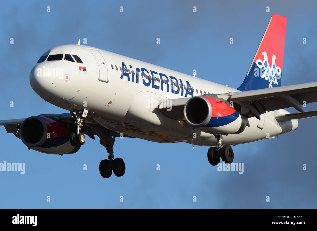 Air Serbia is the flag carrier and largest airline of Serbia. The airline was formerly known as Jat Airways. Airbus A319 jet plane YU-APE landing LHR Stock Photo