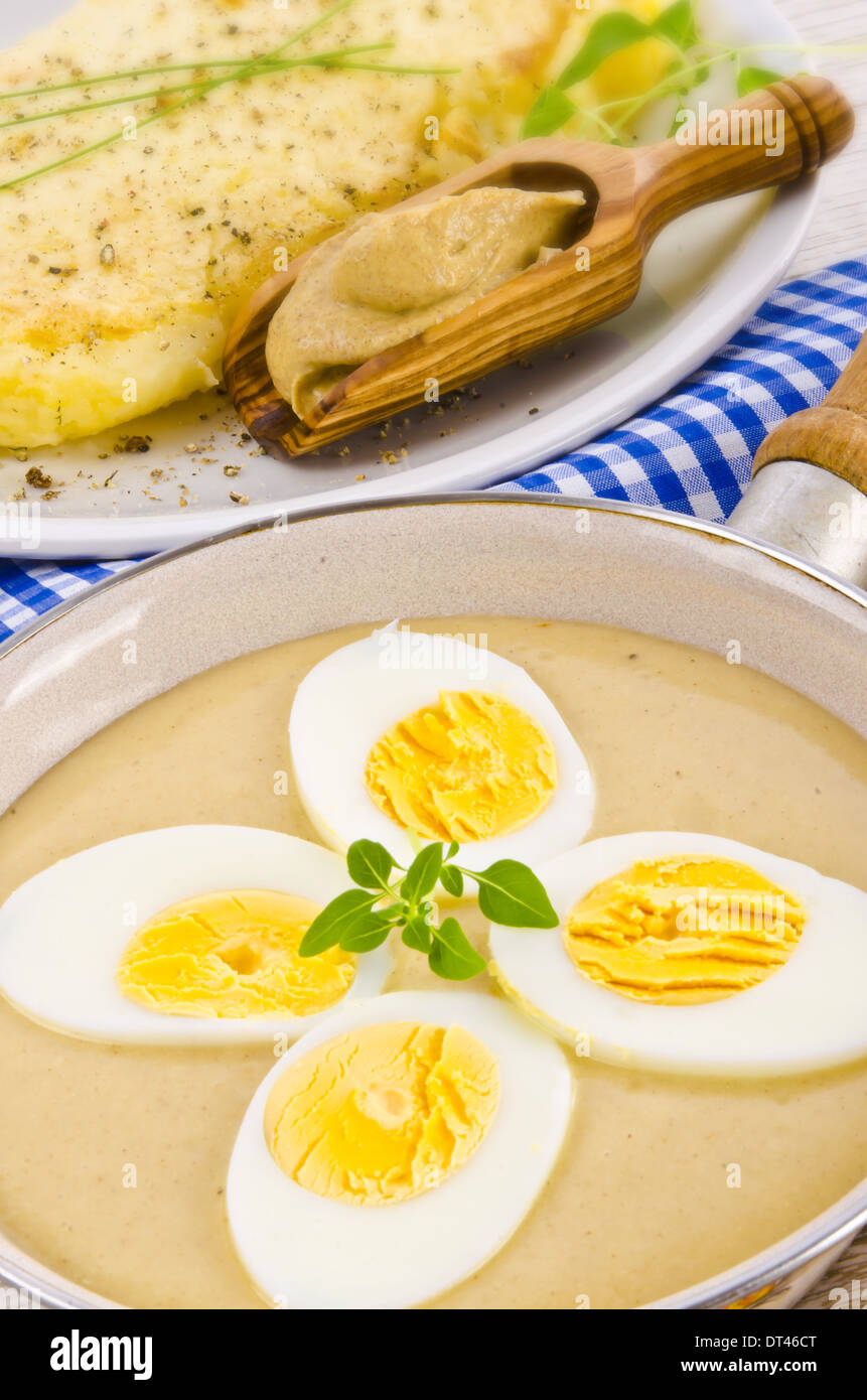 Eggs in mustard sauce Stock Photo Alamy