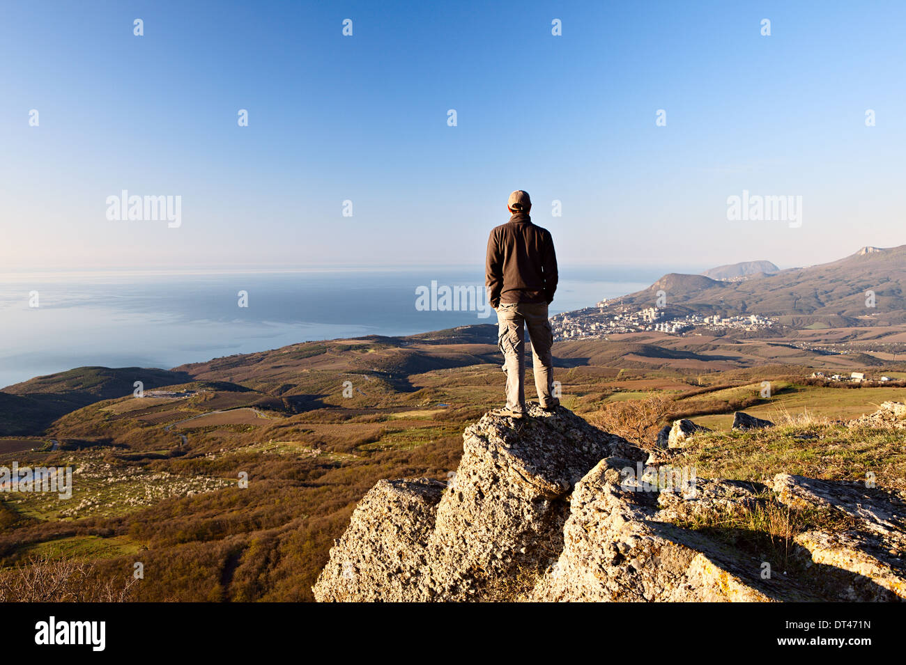 Person on mountain top hi-res stock photography and images - Alamy