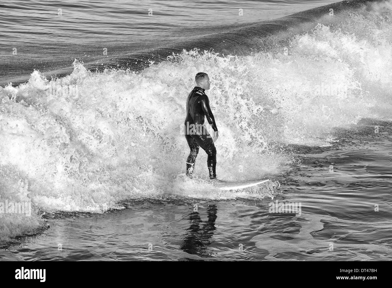 Black And White Photo Of A Man Surfing at Hermosa Beach, Los Angeles ...