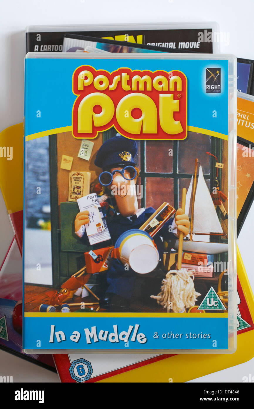 pile of DVDs with Postman Pat in a muddle & other stories DVD on top set on white background Stock Photo
