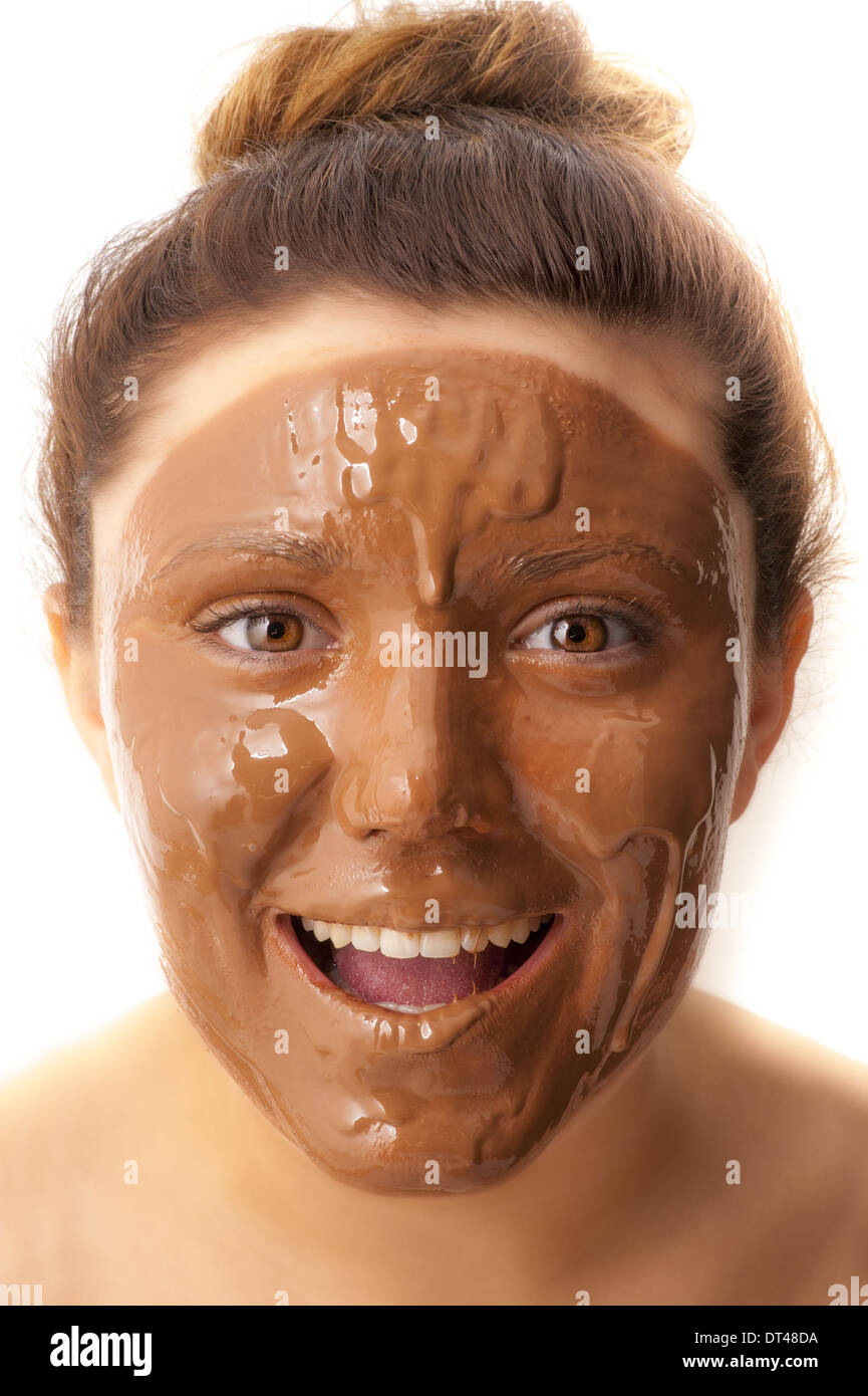 Girl with chocolate covered face and teeth Stock Photo