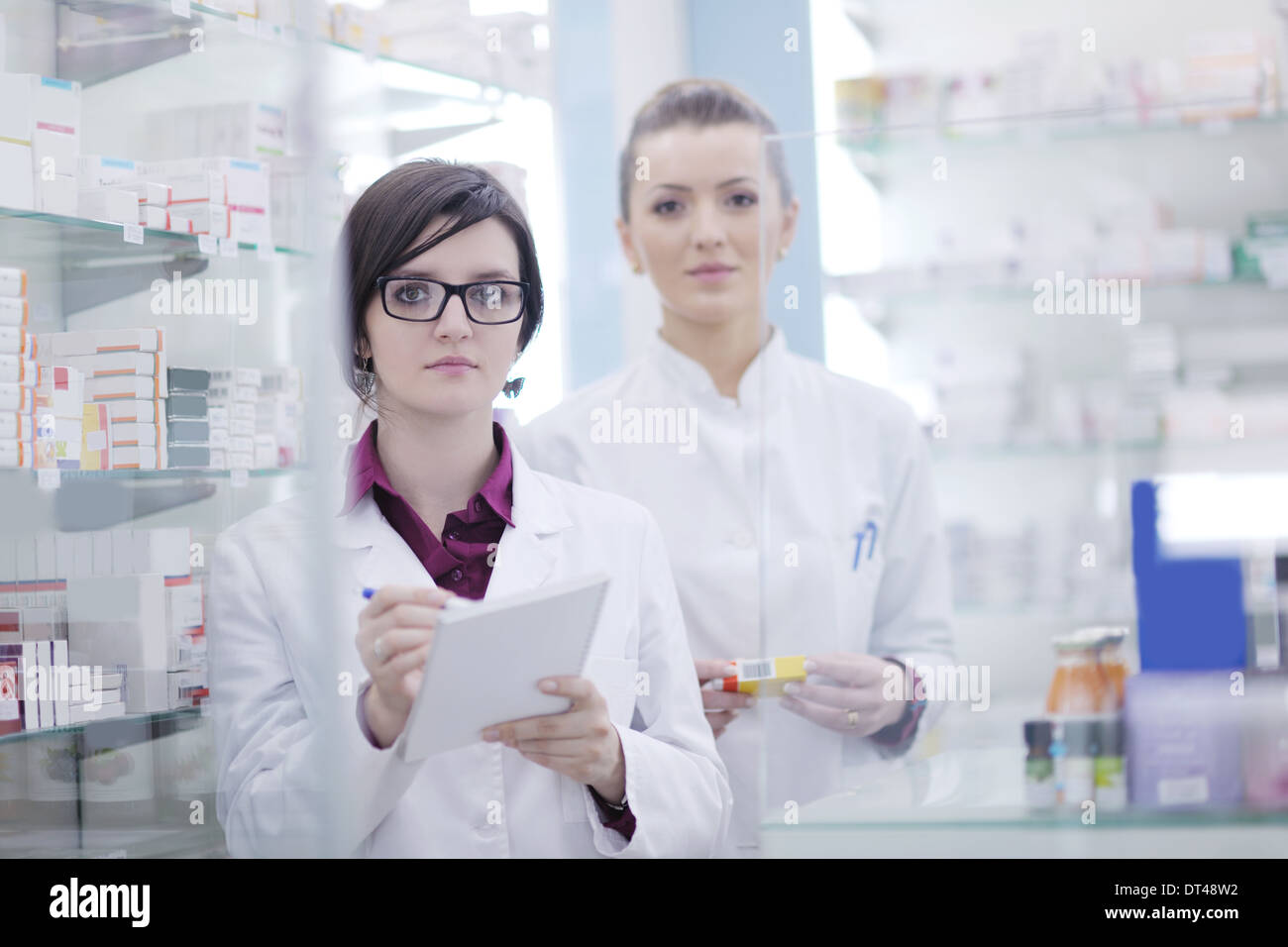 team of pharmacist chemist woman in pharmacy drugstore Stock Photo - Alamy