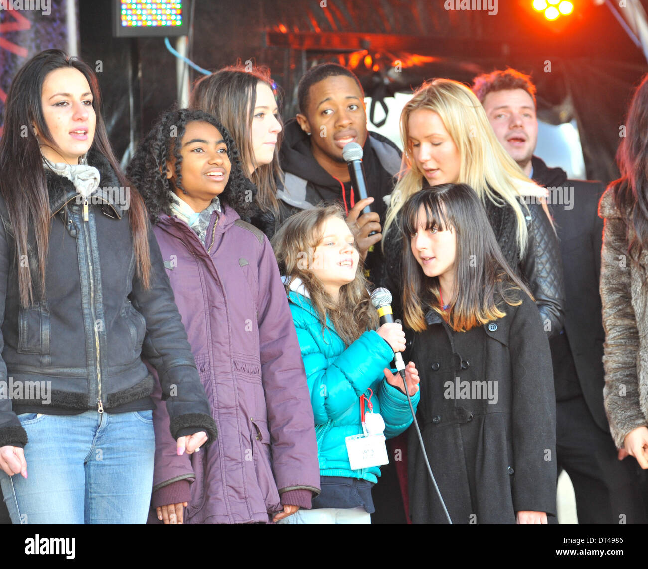 Trafalgar Square, London, UK. 8th February 2014.  Members of the group, sing at the release of the charity single 'Miss You Machine'. Aiming to raise money on behalf of the Fusiliers Aid Society in memory of Lee Rigby and others like him. Credit:  Matthew Chattle/Alamy Live News Stock Photo