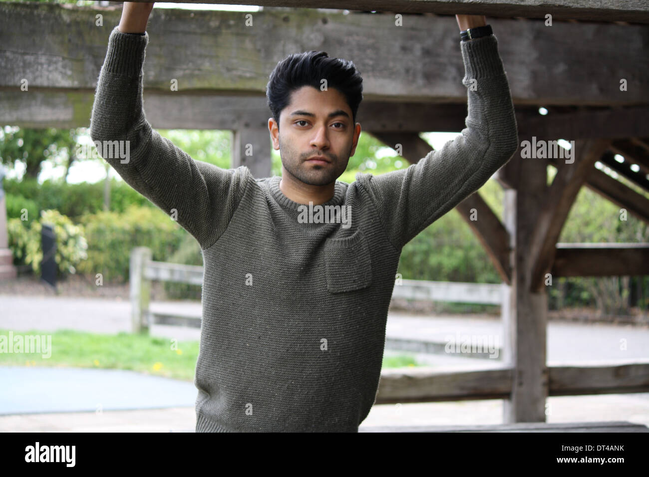 Male hands holding up hi-res stock photography and images - Alamy