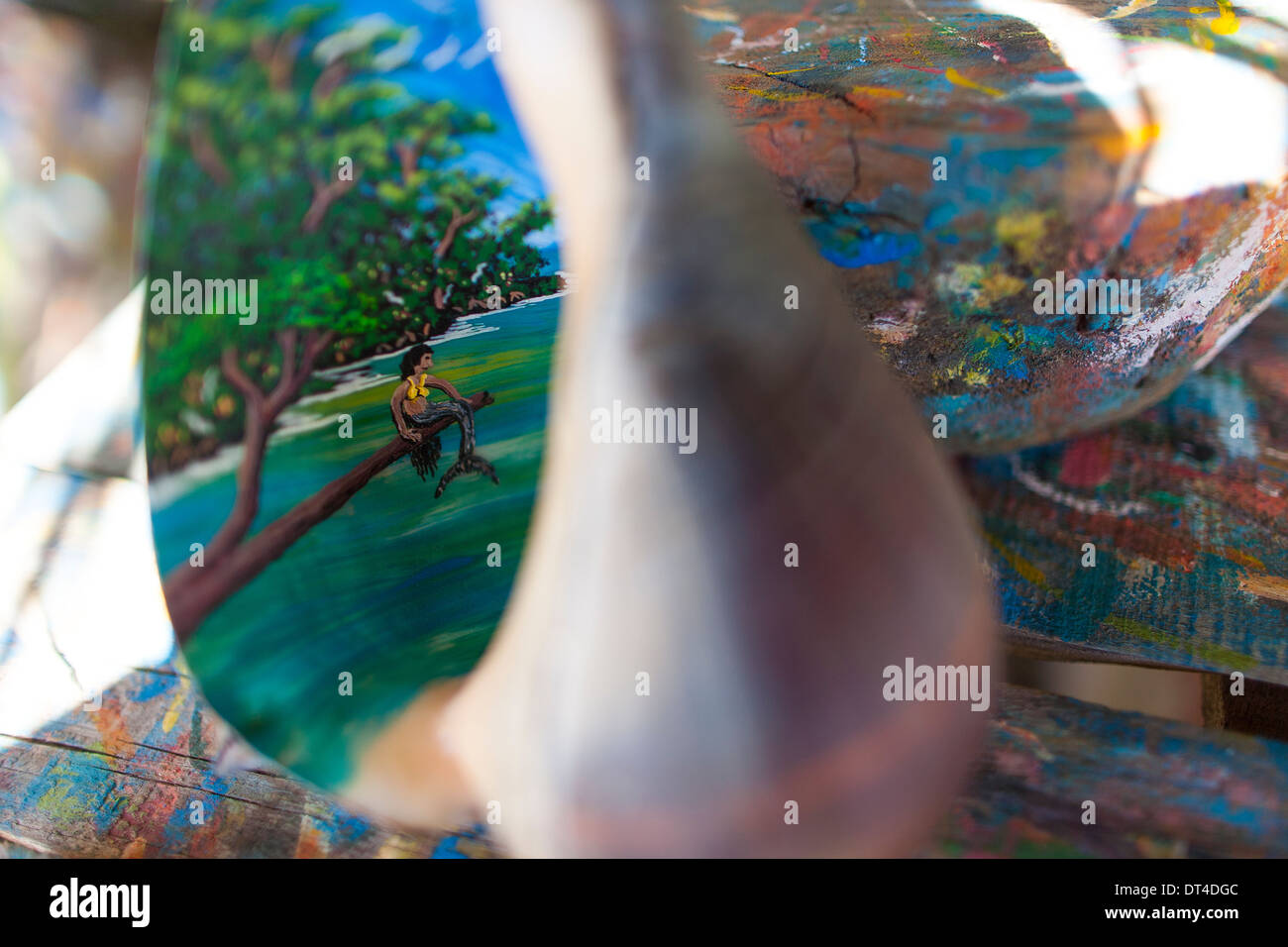 Hand painted artwork, a shell painted a beach scene created by artisan in La Libertad, a port city on the coast of El Salvador Stock Photo