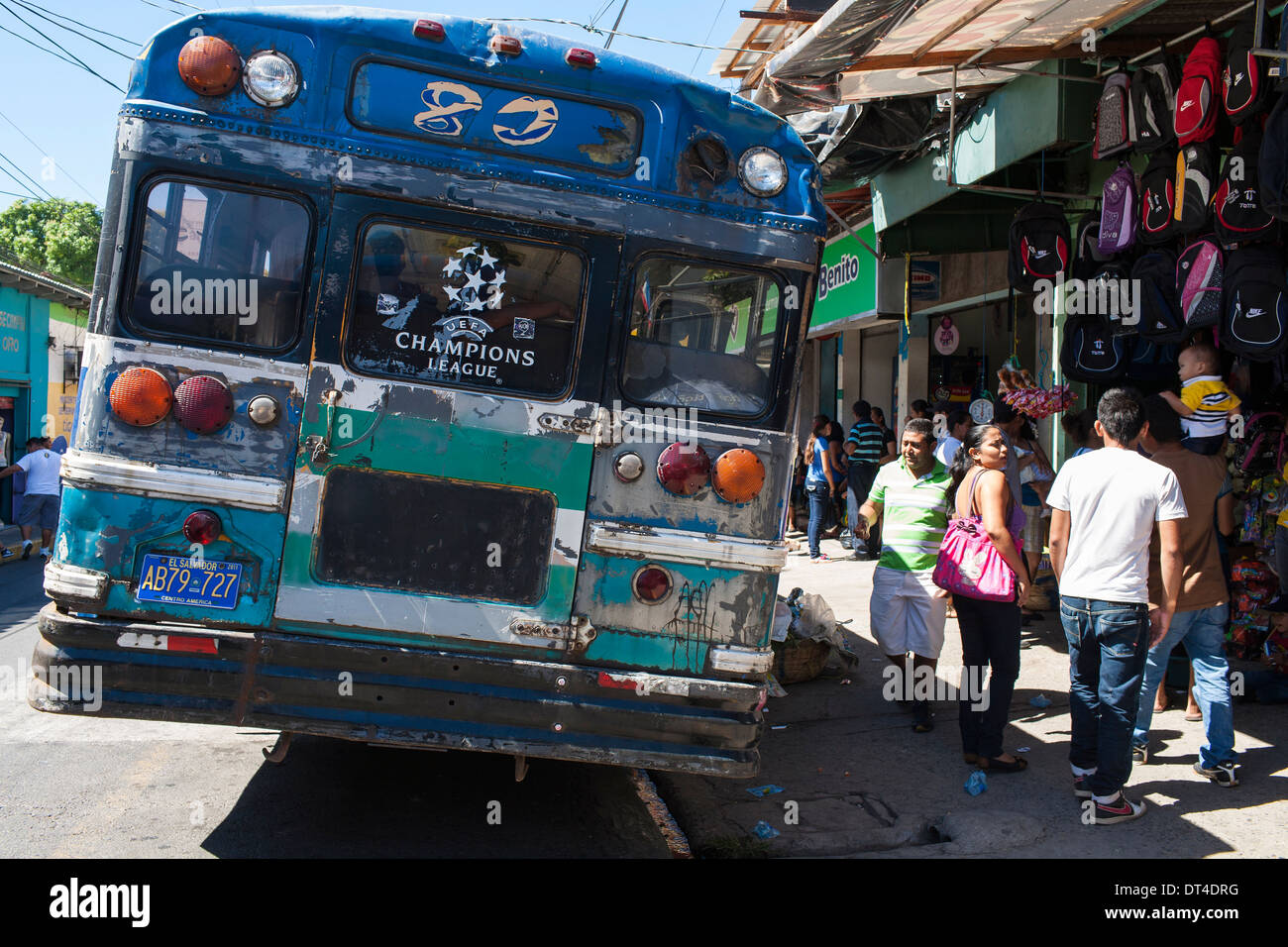 Premier League logo on a public bus, an old school bus, in the center of La Libertad, a port city on the coast of El Salvador Stock Photo