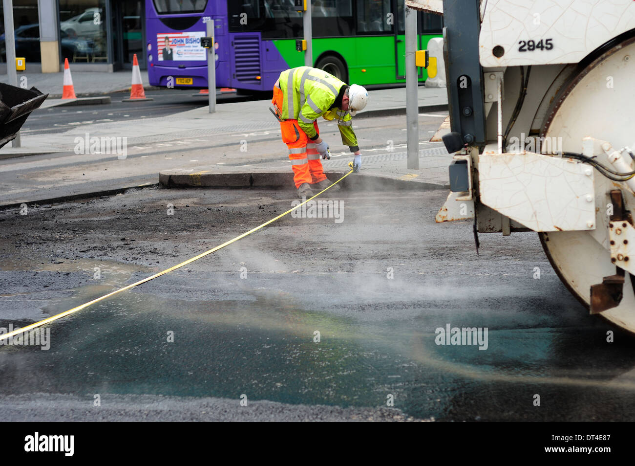 Road Works,Repairing Burst Water Pipe And Laying New Road Surface