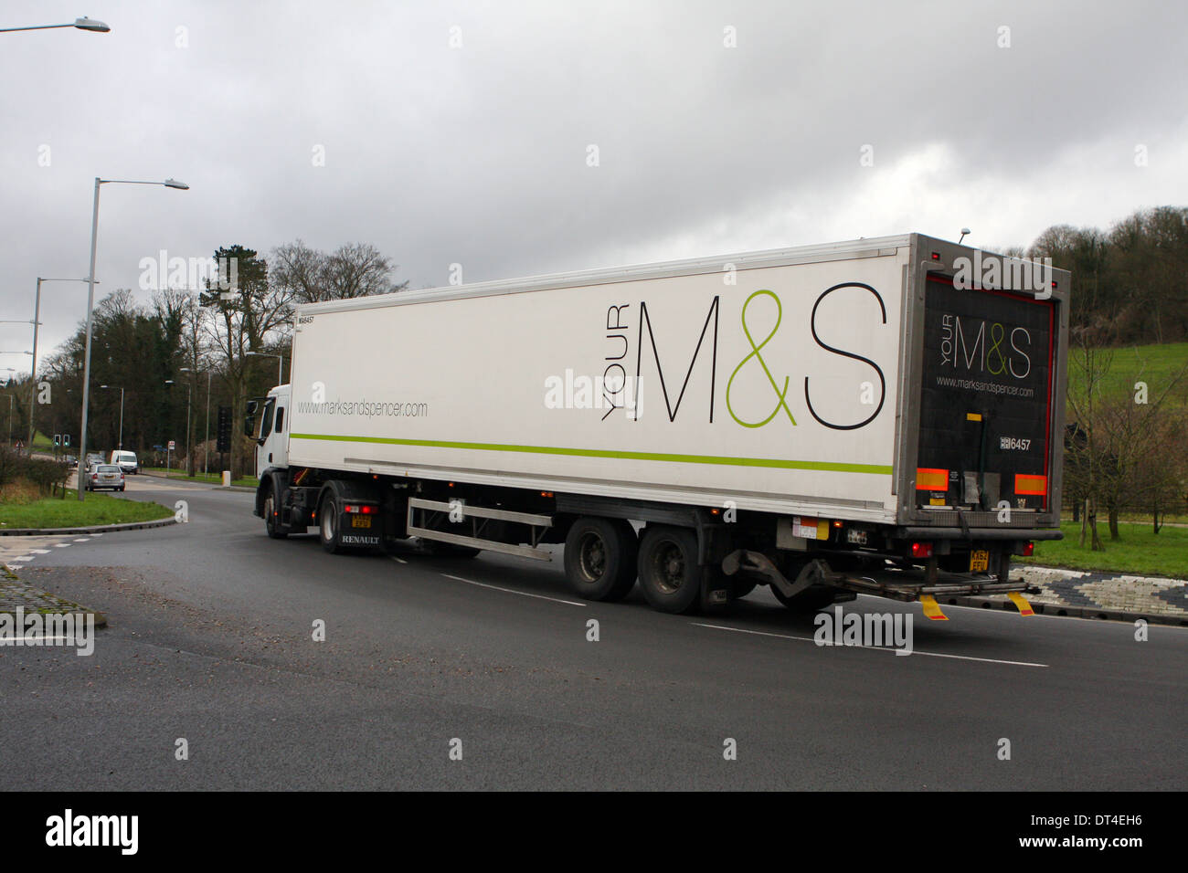 A truck traveling around a roundabout in Coulsdon, Surrey, England Stock Photo